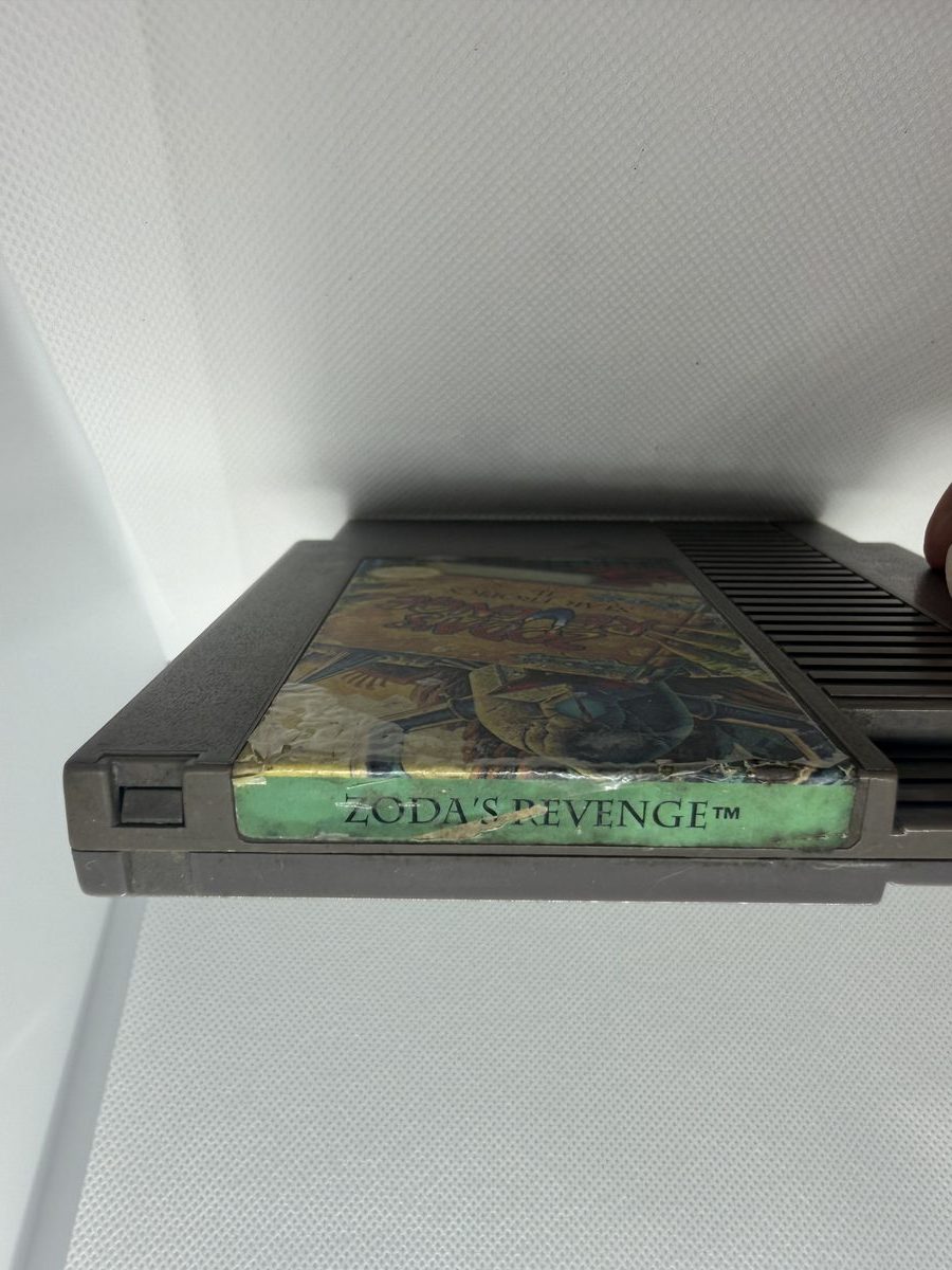 Zoda's Revenge — spine label torn and peeling away from the shell