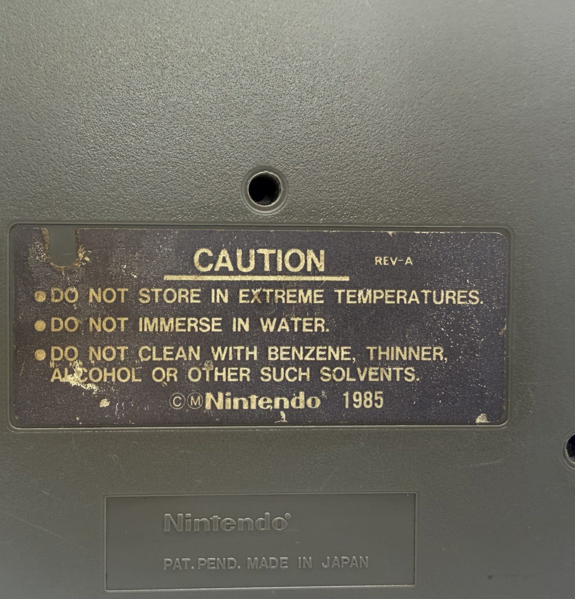Yo! Noid — back shell, center screw missing
